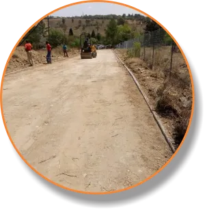 Road works crew on a gravel road during civil construction